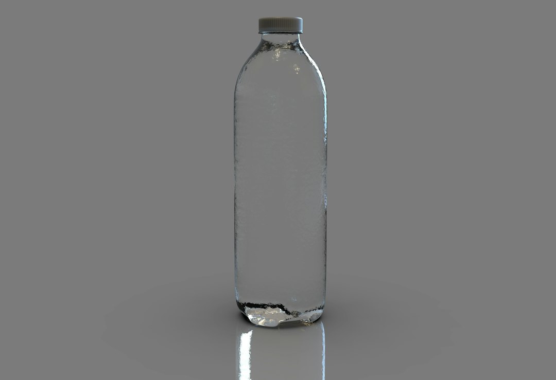 a glass bottle with water inside of it